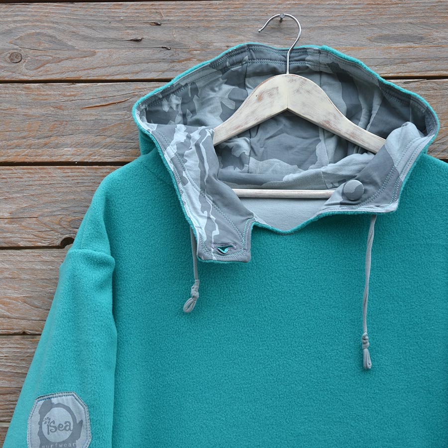 Close up Men's reversible hoody size large in jade and grey