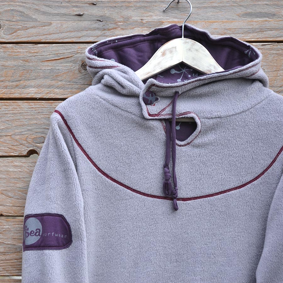 Close up Women's hoody dress in light grey and plum