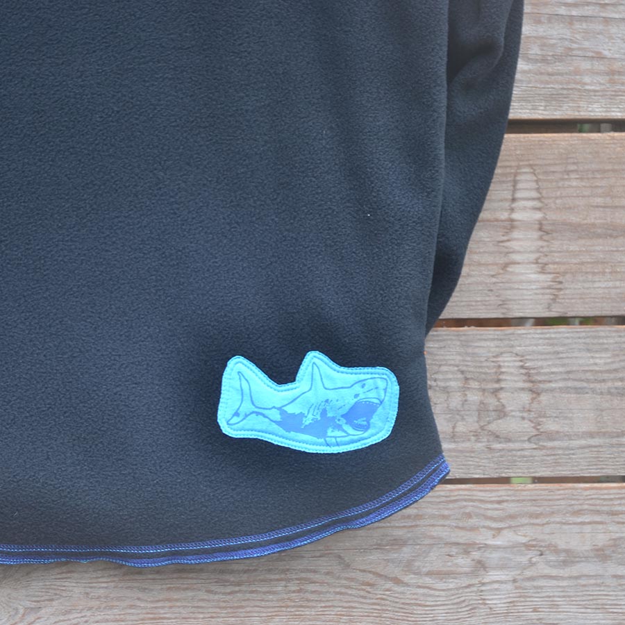 Fleece close up Men's reversible hoody in black/turquoise