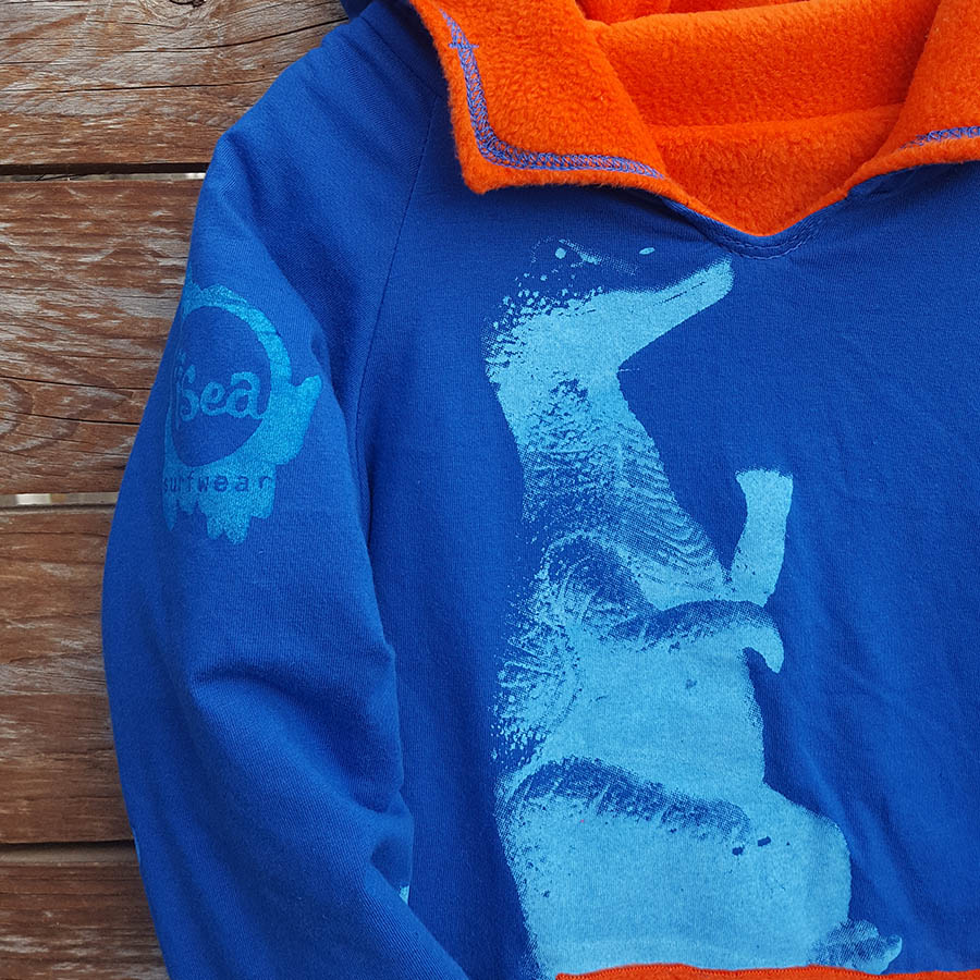Kid's reversible hoody in orange/royal - Close up Kids reversible dinosaur hoody in orange/royal