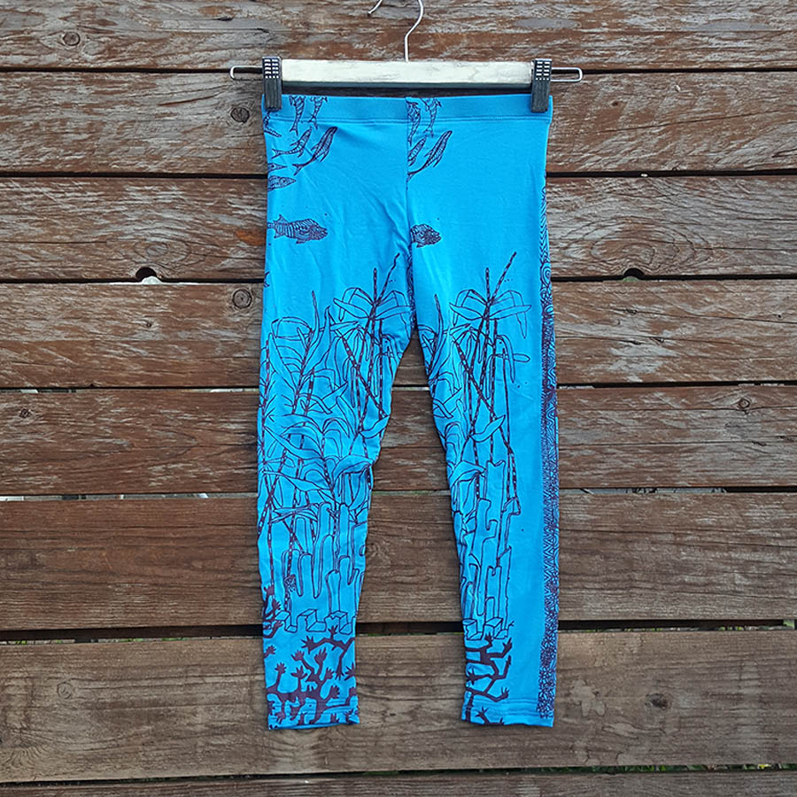 Kid's leggings in turquoise/plum with mermaid scene Kid's leggings in turquoise/plum with mermaid scene