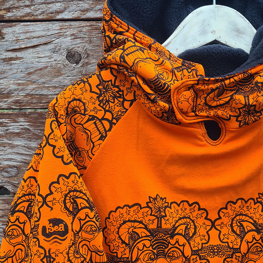 orange closeup2 Kid's reversible hoody black and orange